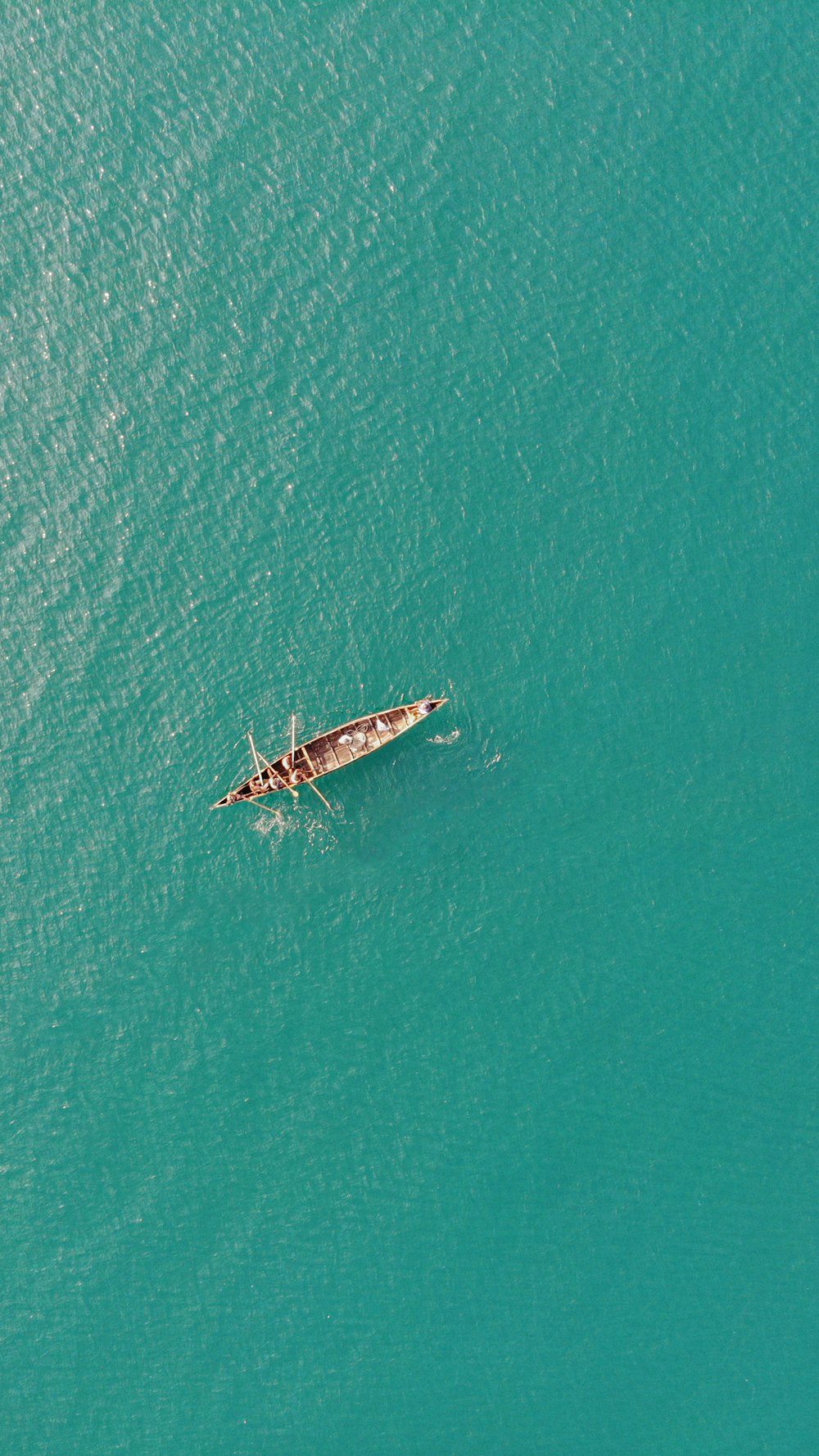 aerial view of white boat on sea during daytime