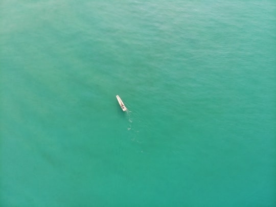 aerial view of boat on sea during daytime in Varkala India