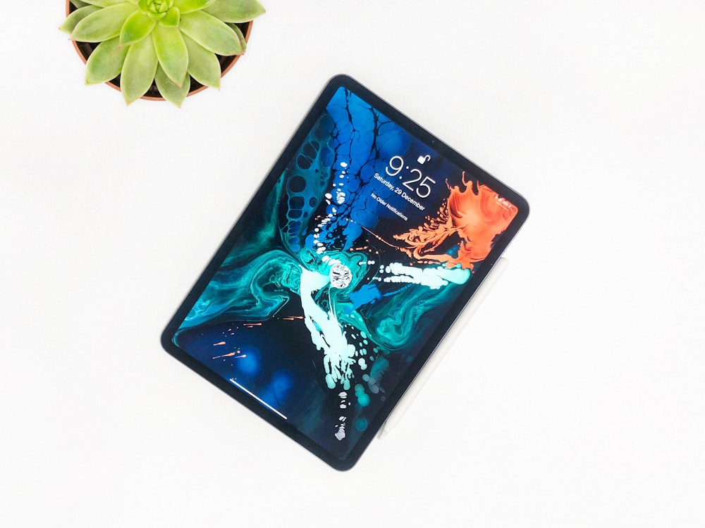 black and blue floral tablet computer