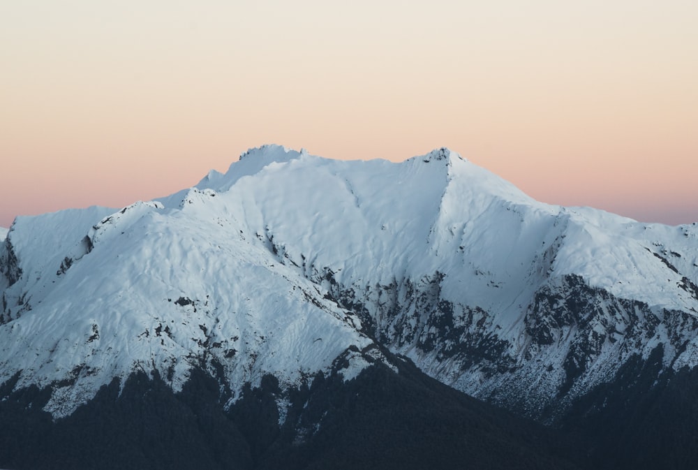 snow covered mountain during daytime