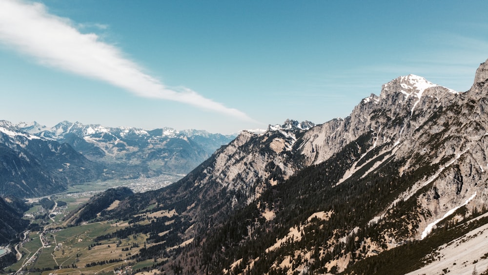 brown and white mountains under blue sky during daytime