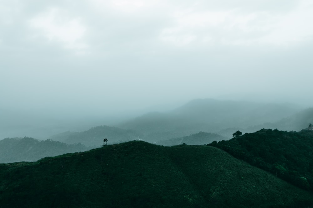 green mountains under white sky during daytime