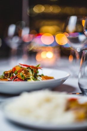 Close-up of a beautifully plated dish with natural lighting highlighting vibrant colors.