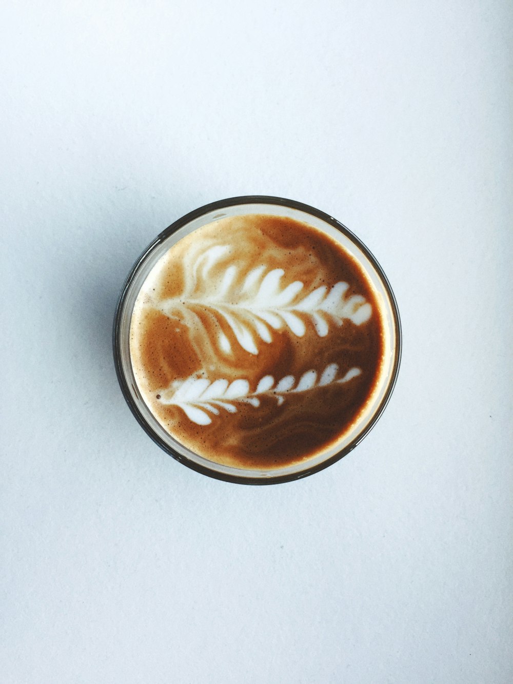 brown and white round ceramic cup