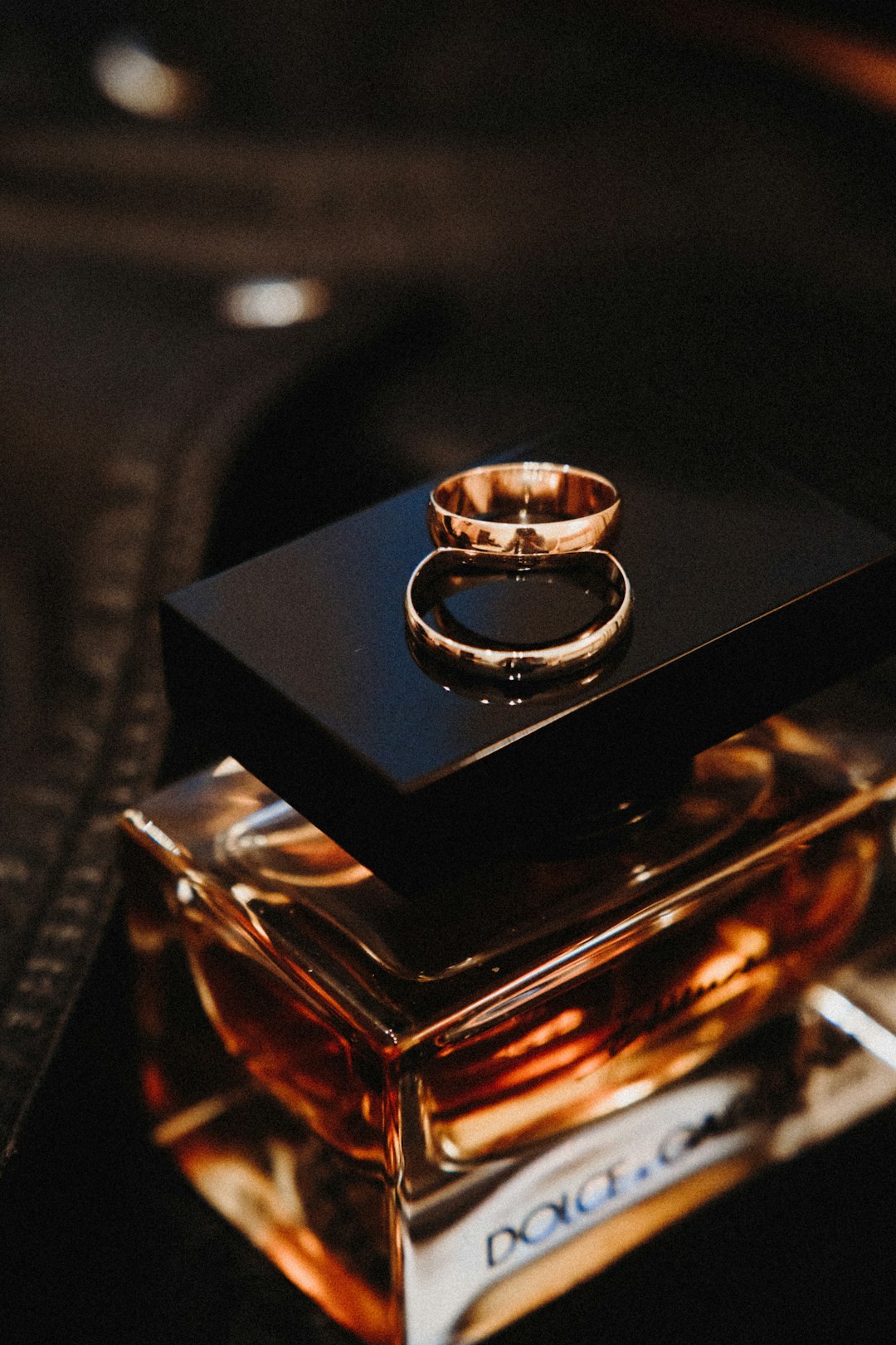 silver ring on black box