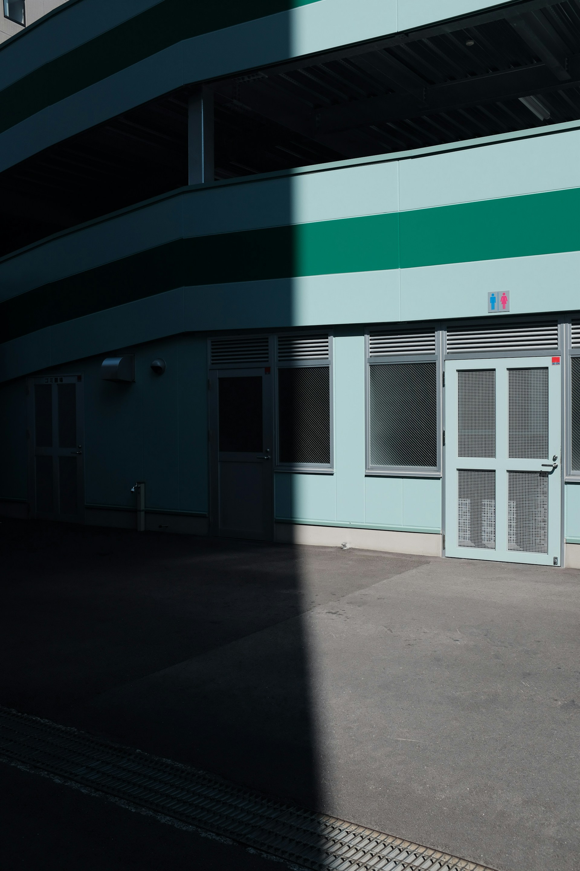 white and green painted building