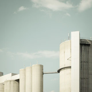 Modern cement storage facilities with clean industrial design.
