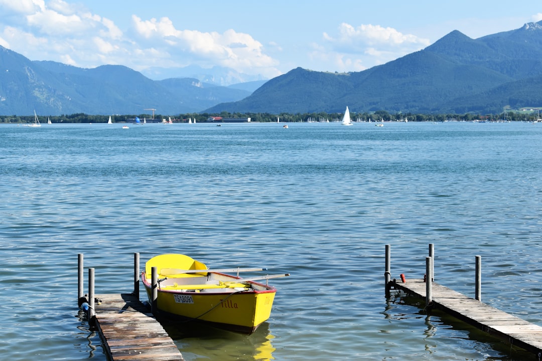 yellow boat on sea during daytime