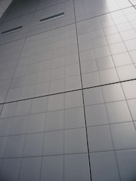 white and blue tiled ceiling