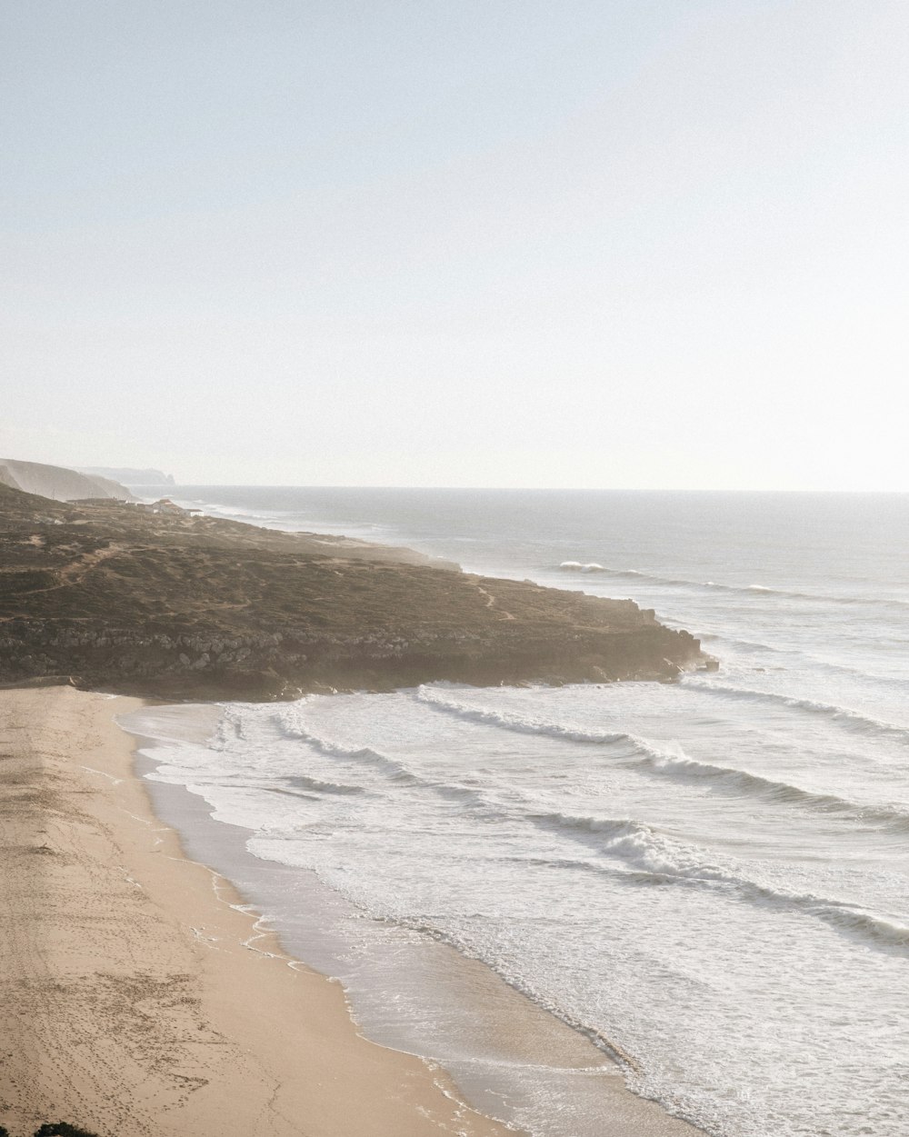 brown sand beach during daytime