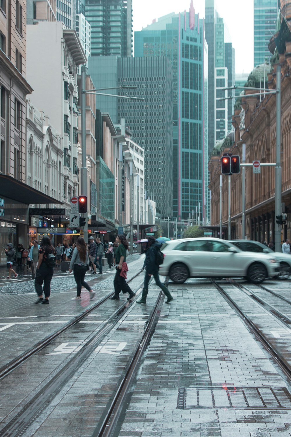 people walking on pedestrian lane during daytime