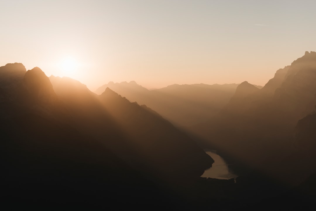 silhouette of mountains during sunset