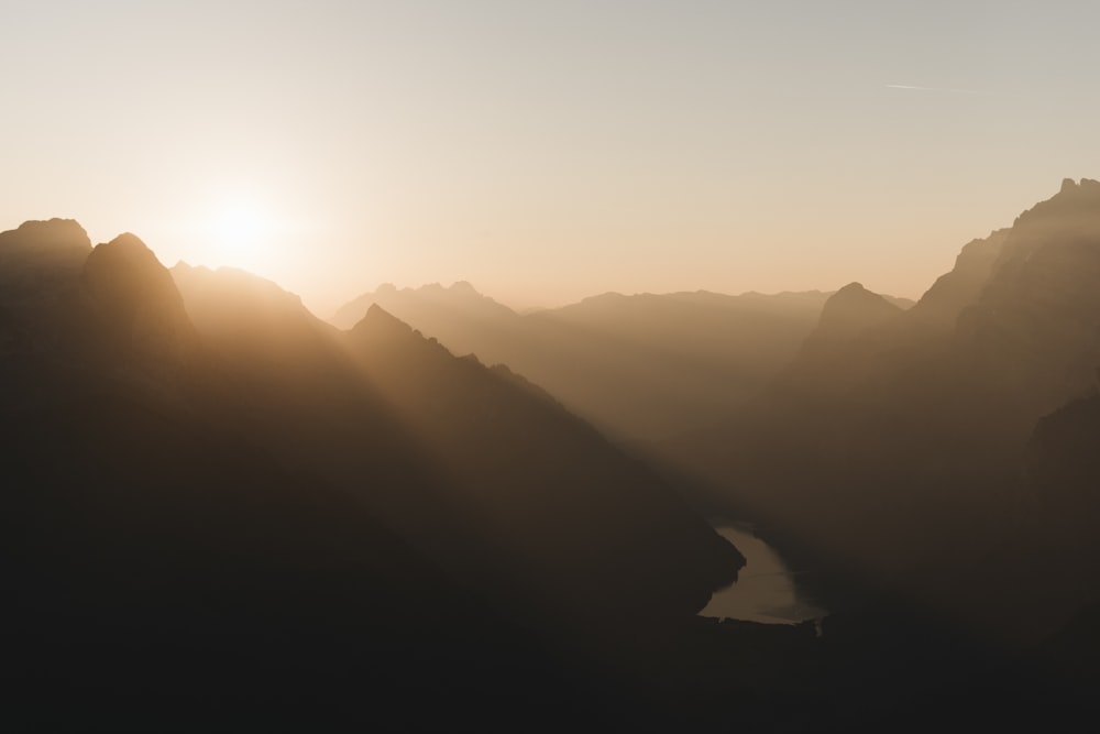 silhouette of mountains during sunset