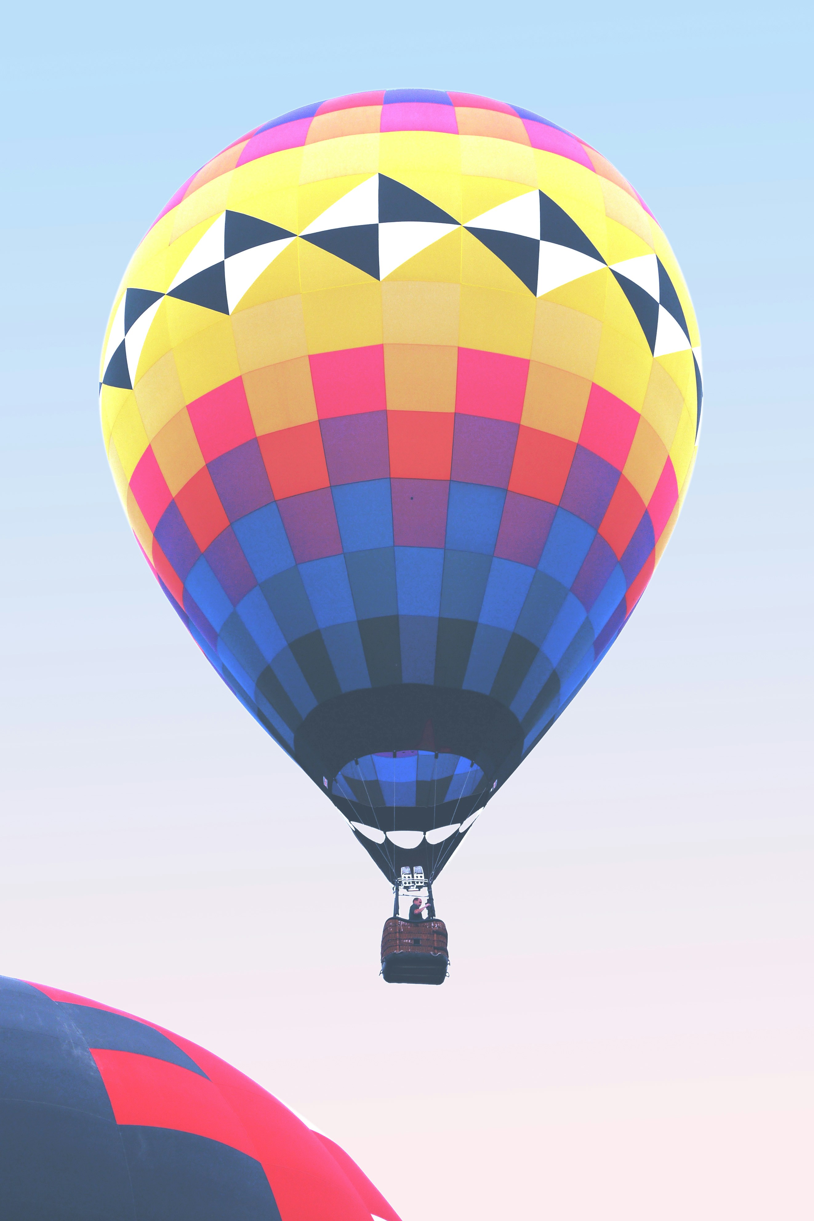 yellow blue and green hot air balloon