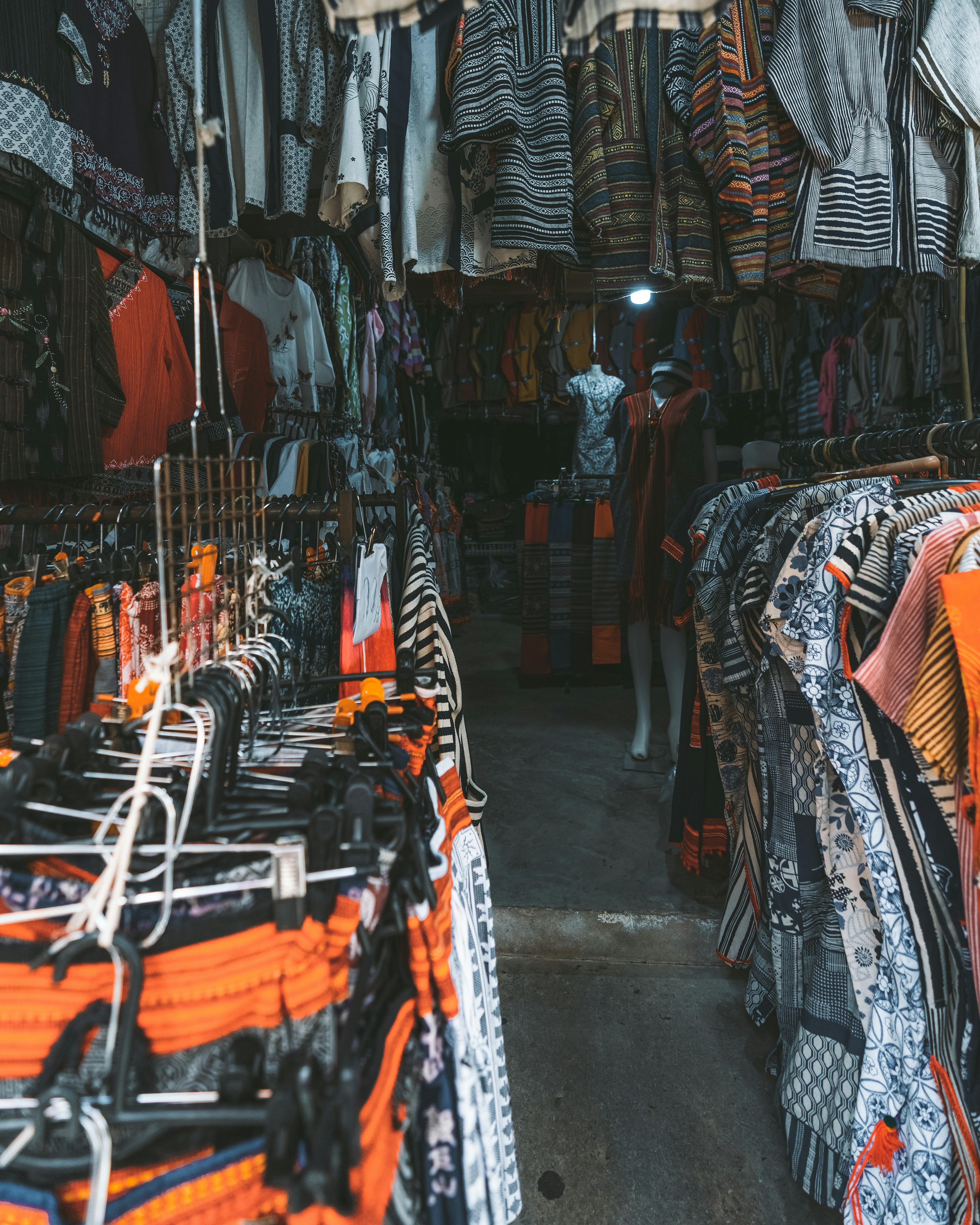 clothes hanged on clothes rack
