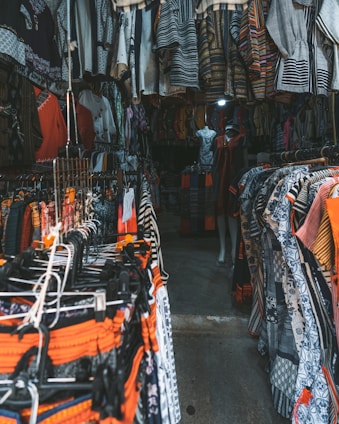 clothes hanged on clothes rack