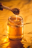 clear glass jar with brown liquid