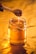 clear glass jar with brown liquid