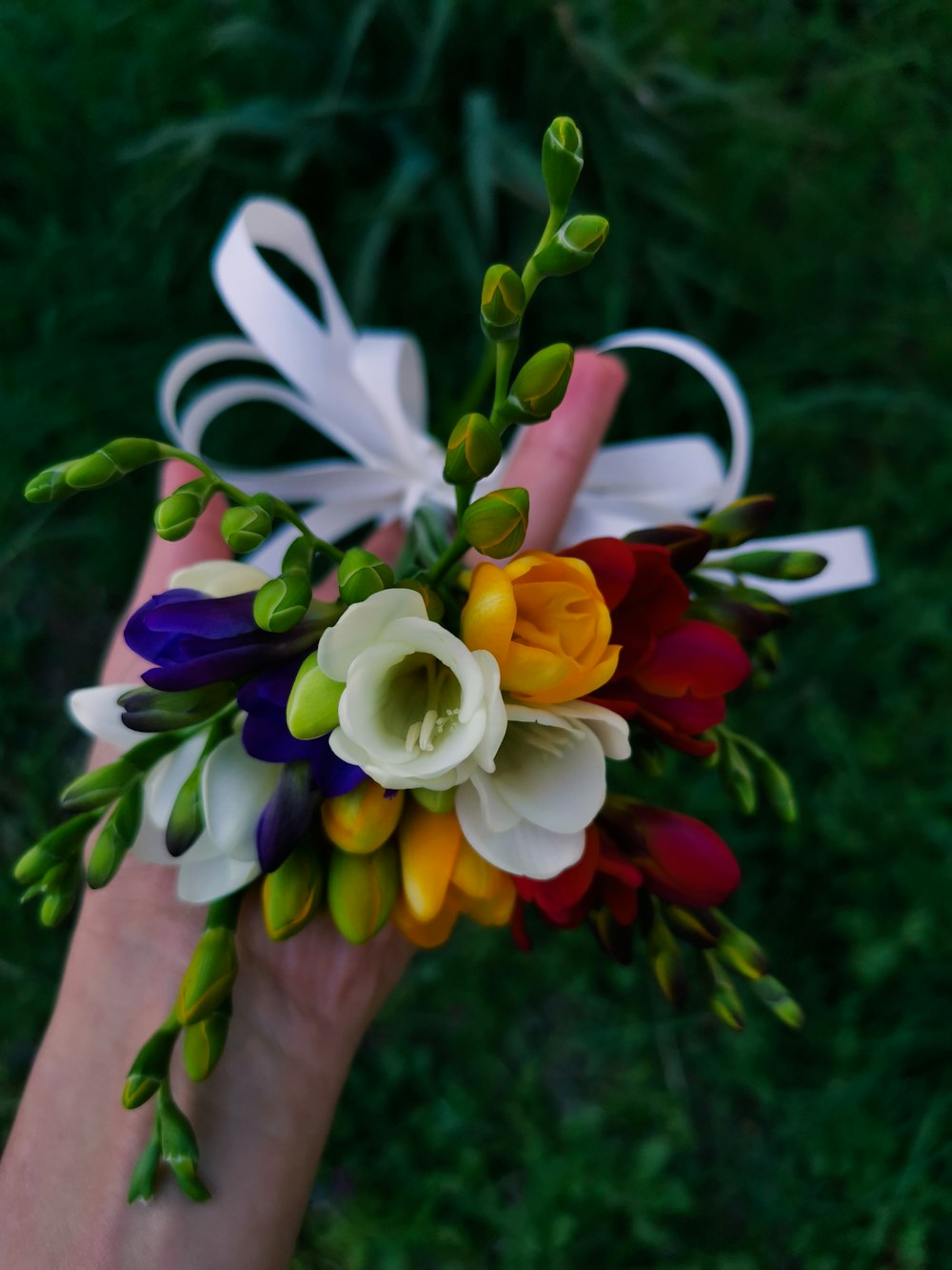 white purple and yellow flower bouquet