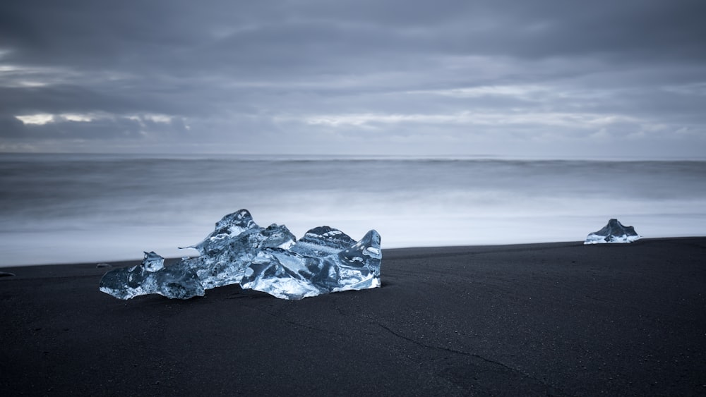 ice blocks on black sand