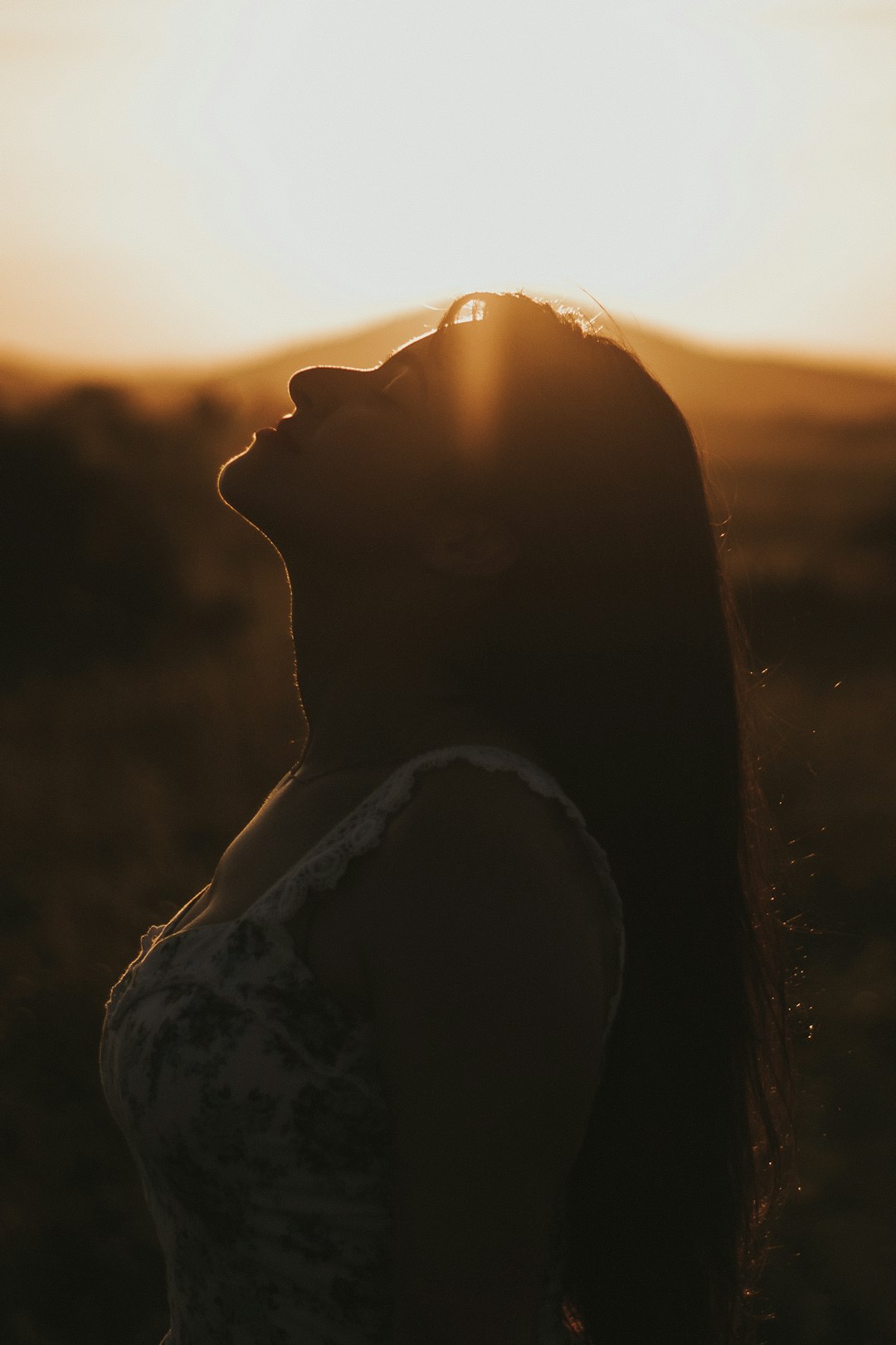 silhouette of woman during sunset