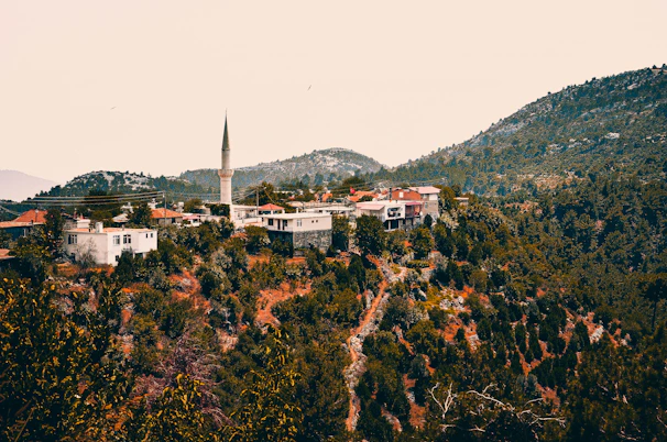 A panoramic shot of a mountain village nestled in the northern Moroccan hills