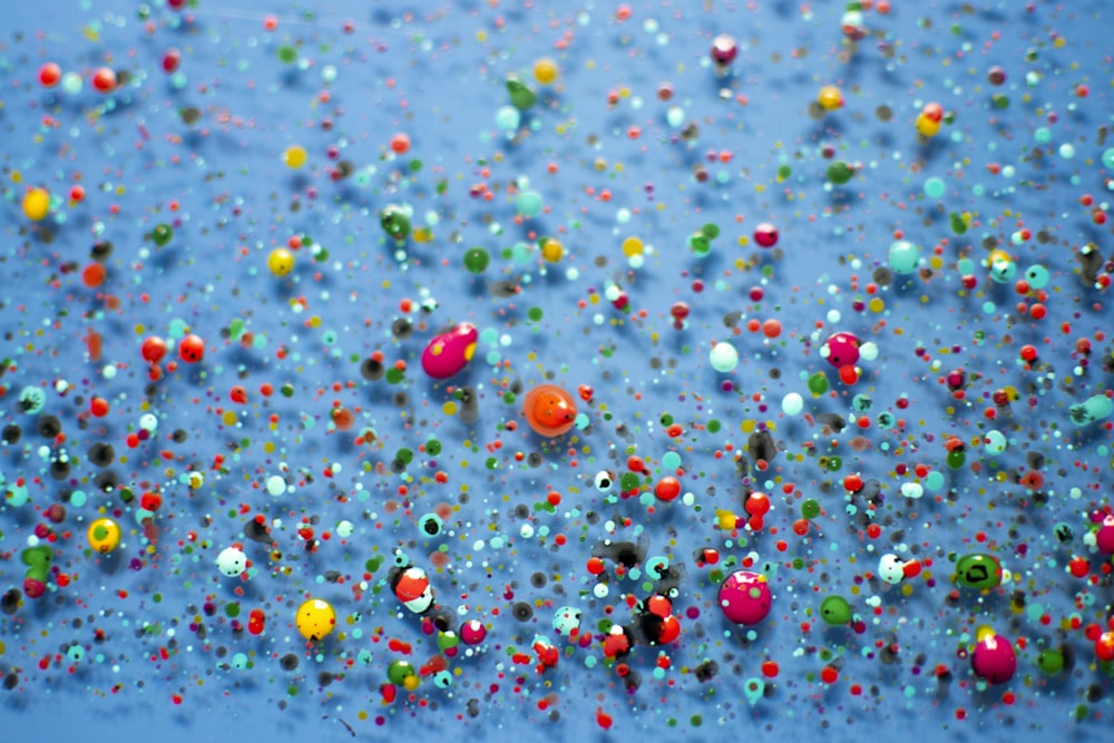 red yellow and blue bubbles on water