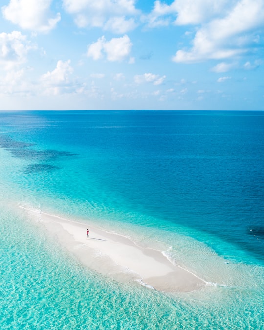 blue sea under blue sky during daytime in Baa Atoll Maldives