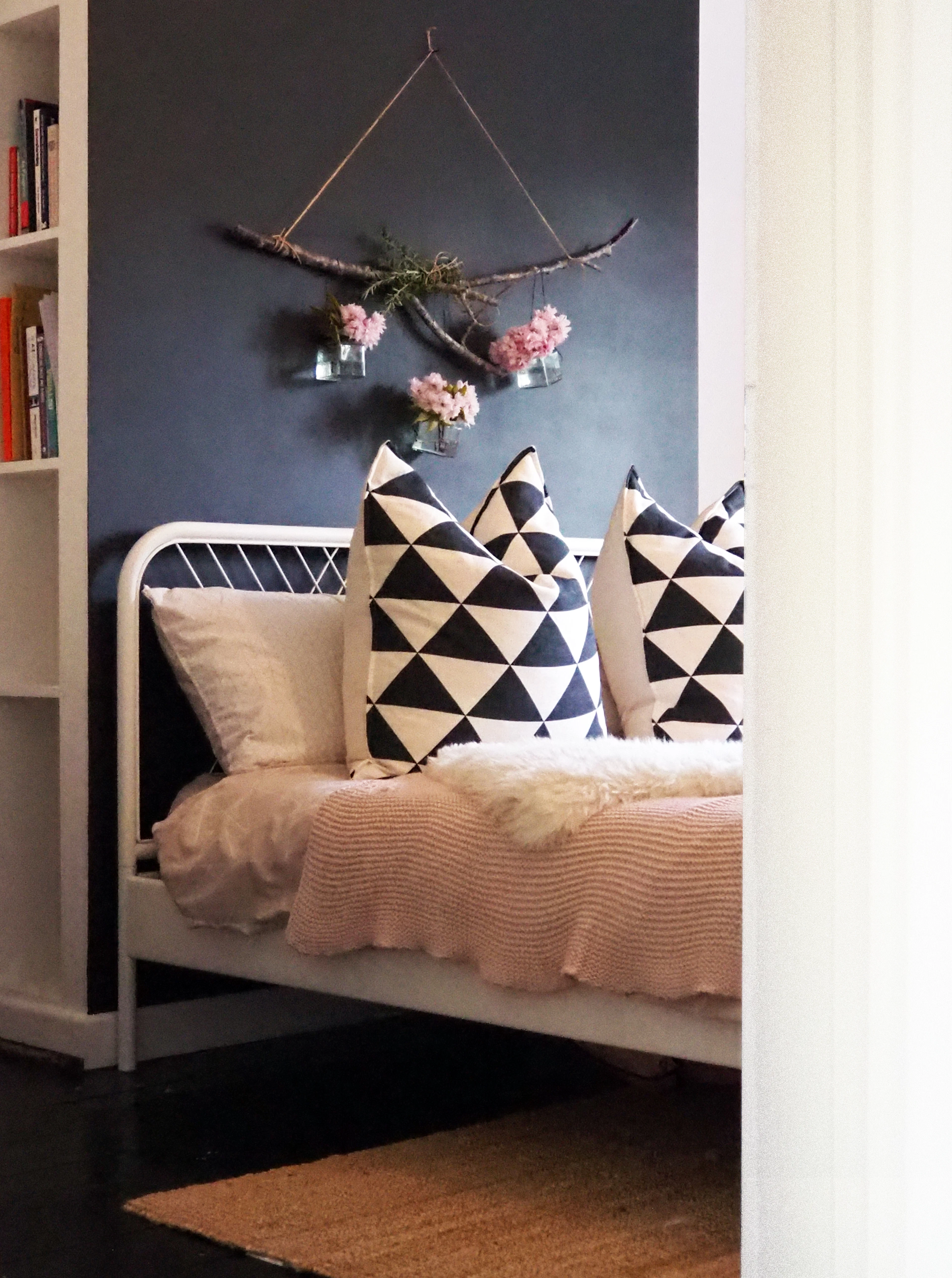 Living room with a white sofa and cushions