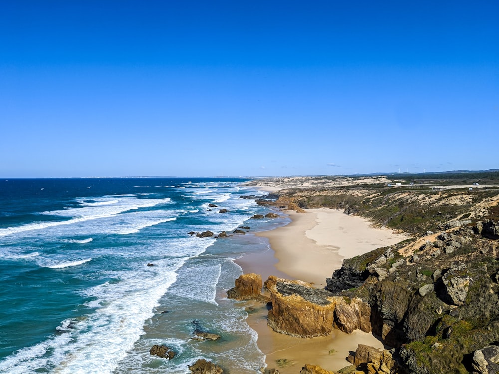 brown sand beach during daytime