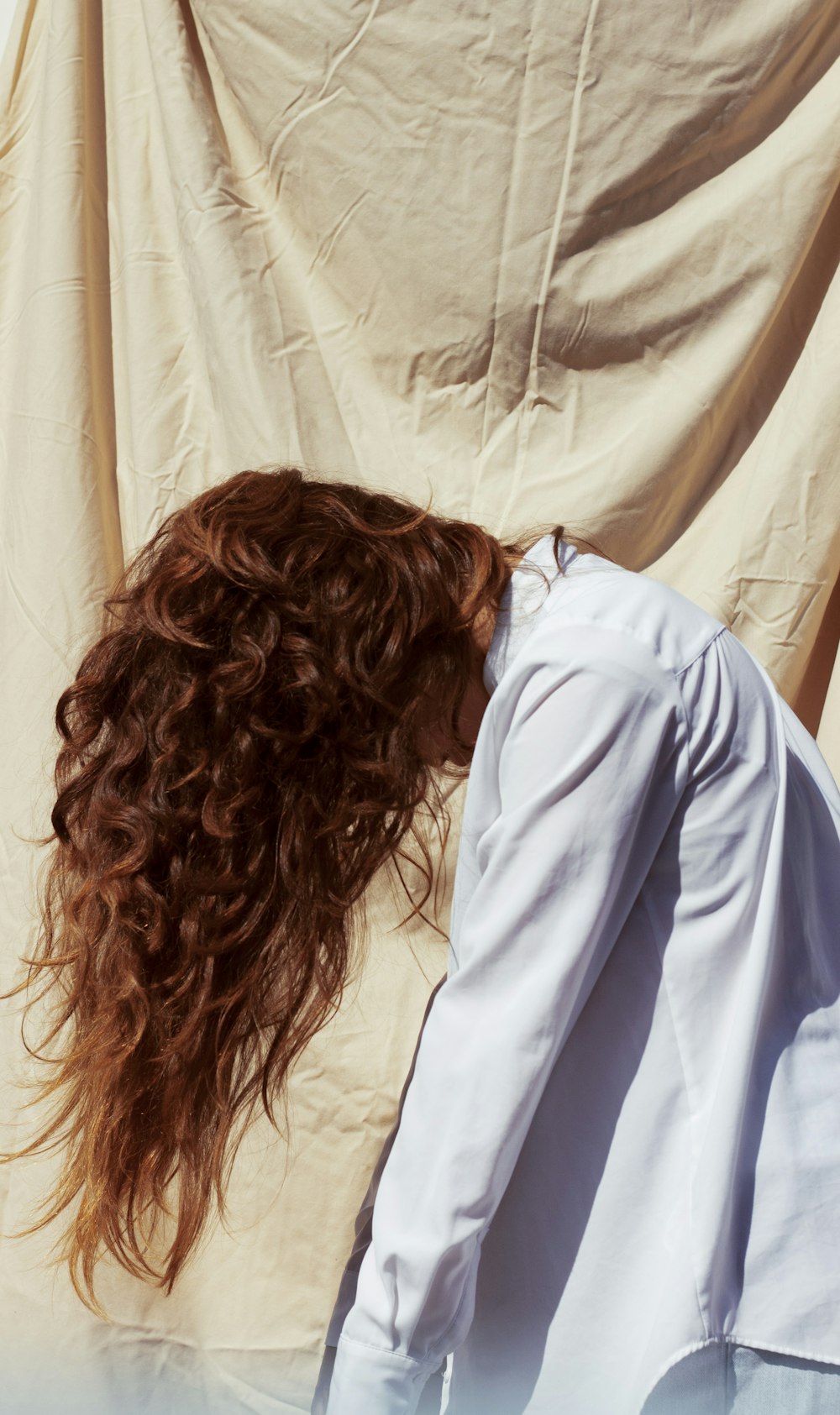 woman in white long sleeve shirt