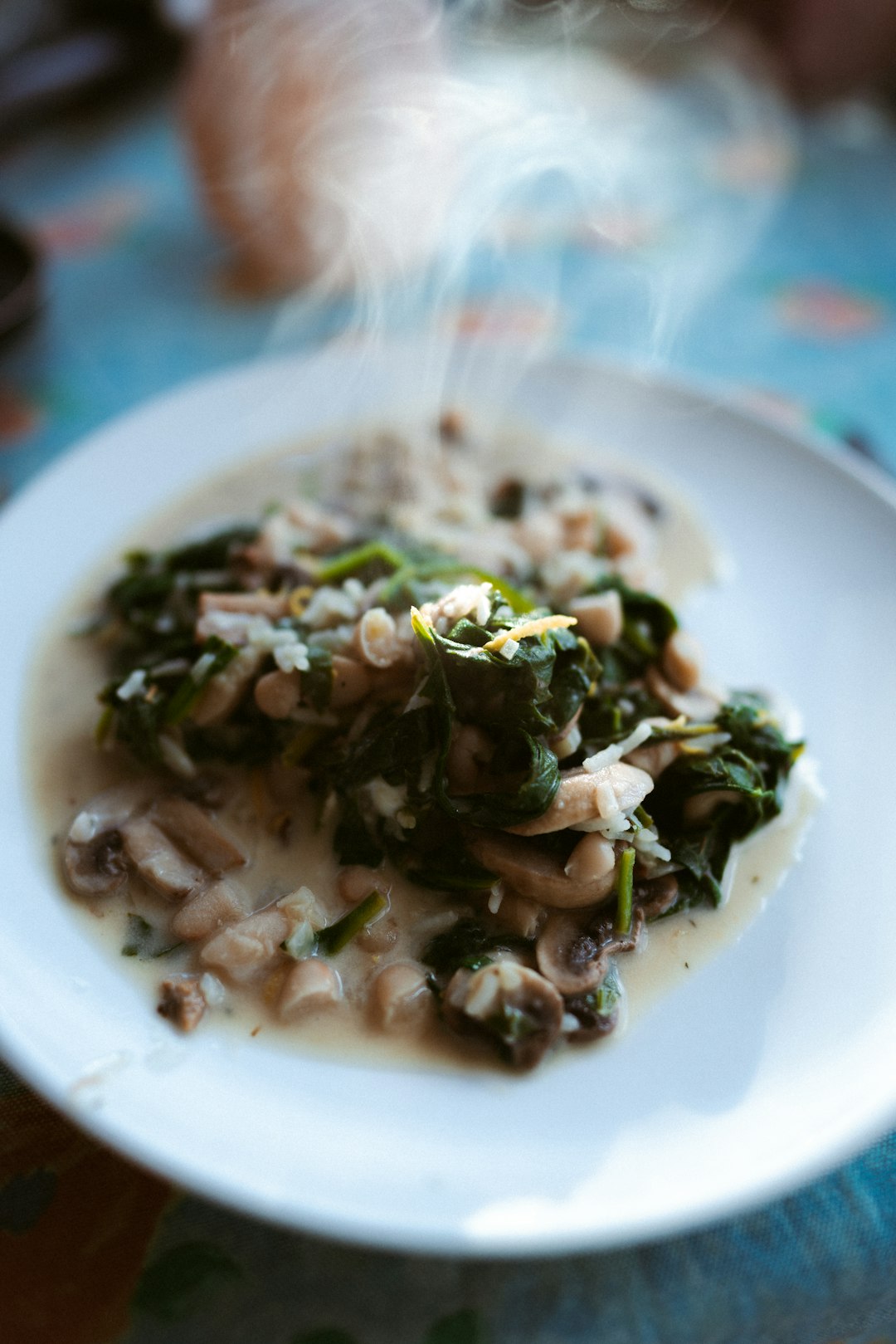 green vegetable dish on white ceramic plate