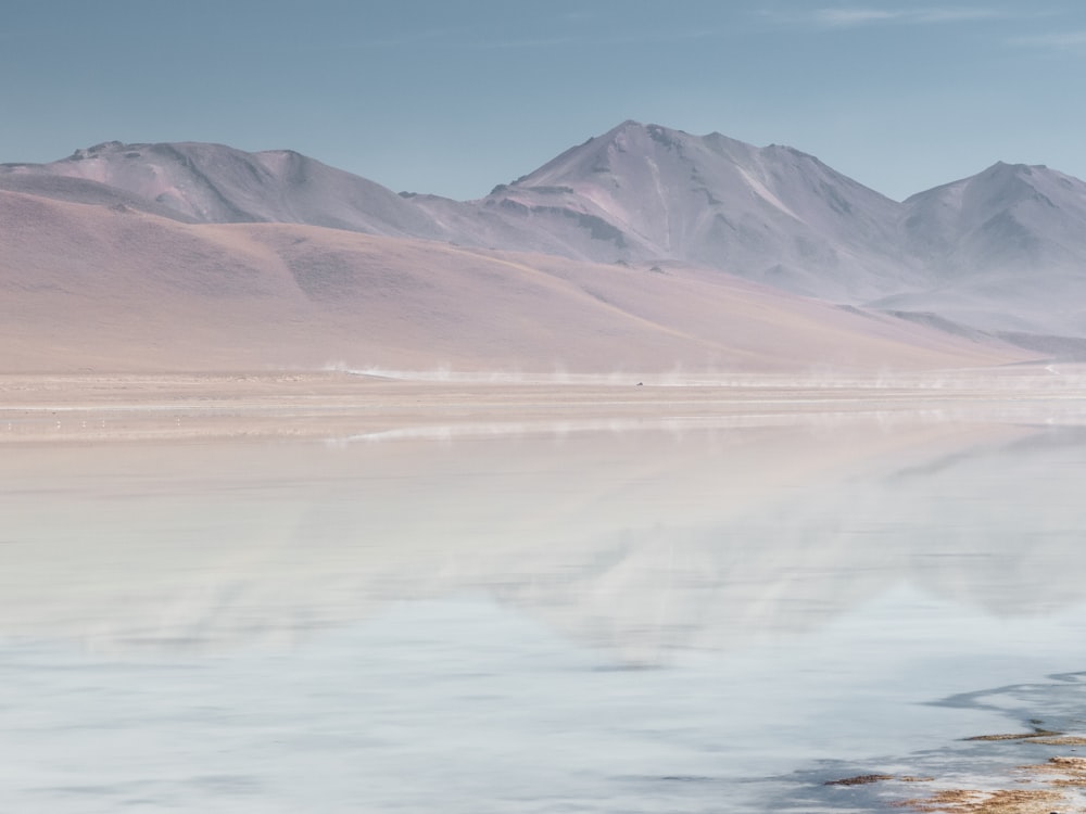 snow covered mountain during daytime