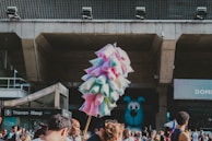 people holding pink umbrella during daytime
