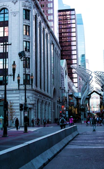 A dynamic city street in Edinburgh bustling with professionals and tech startups.