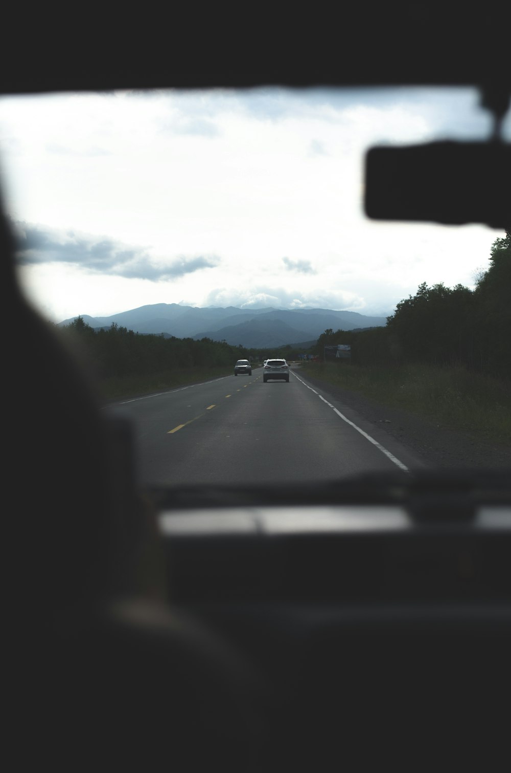 black car on road during daytime