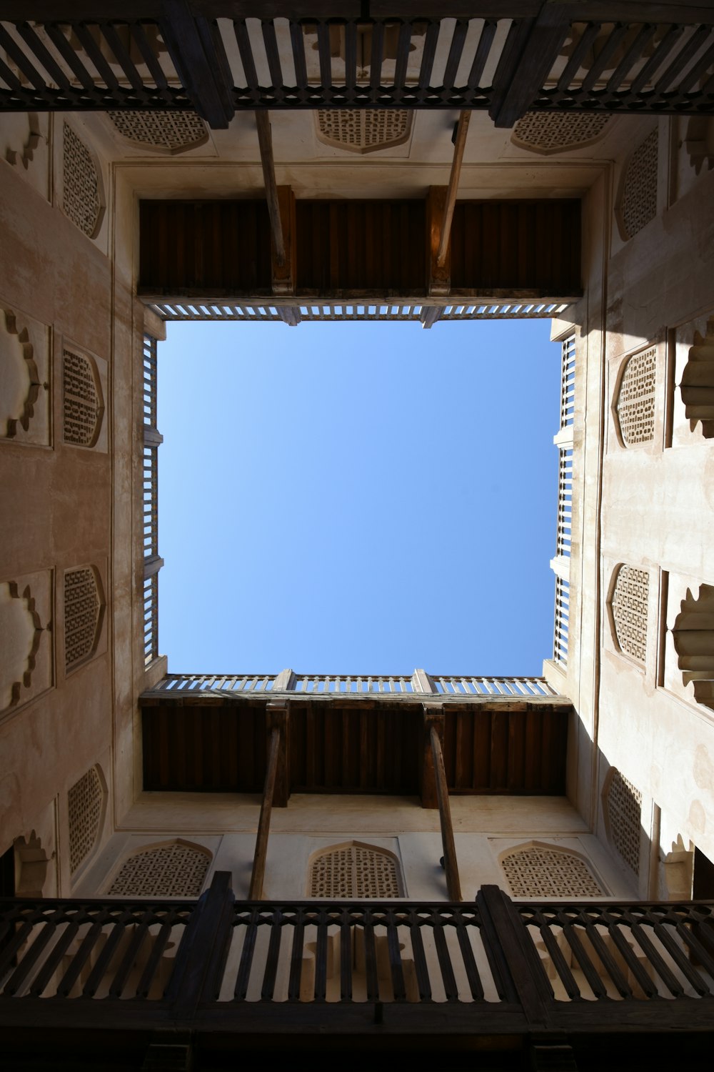 brown concrete building under blue sky during daytime