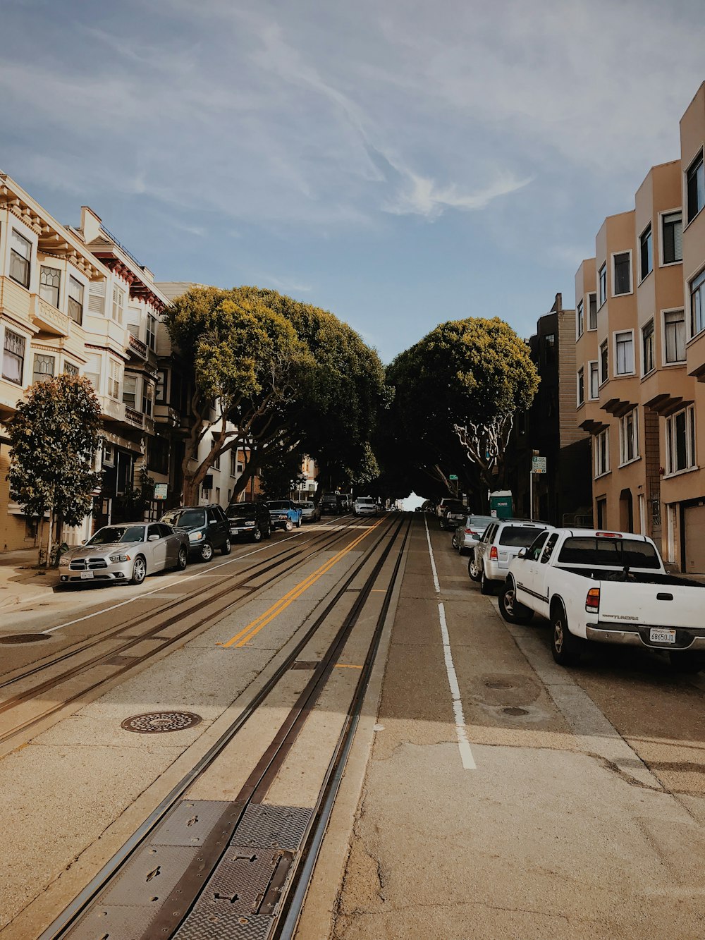 Colorful Victorian houses on a steep San Francisco street