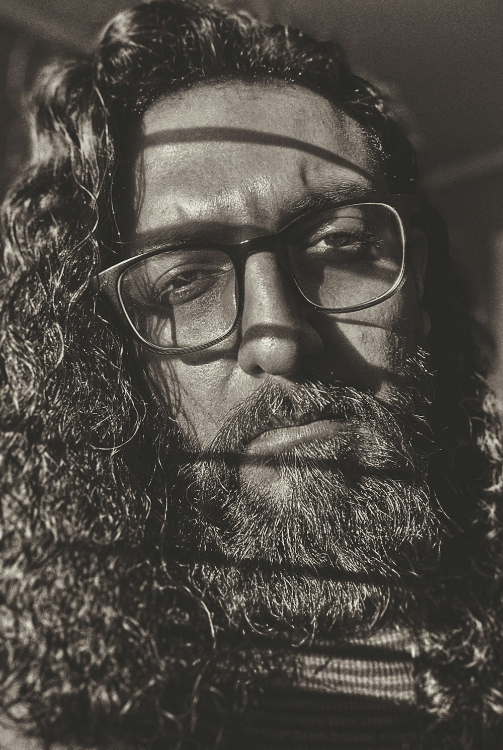 man wearing black framed eyeglasses