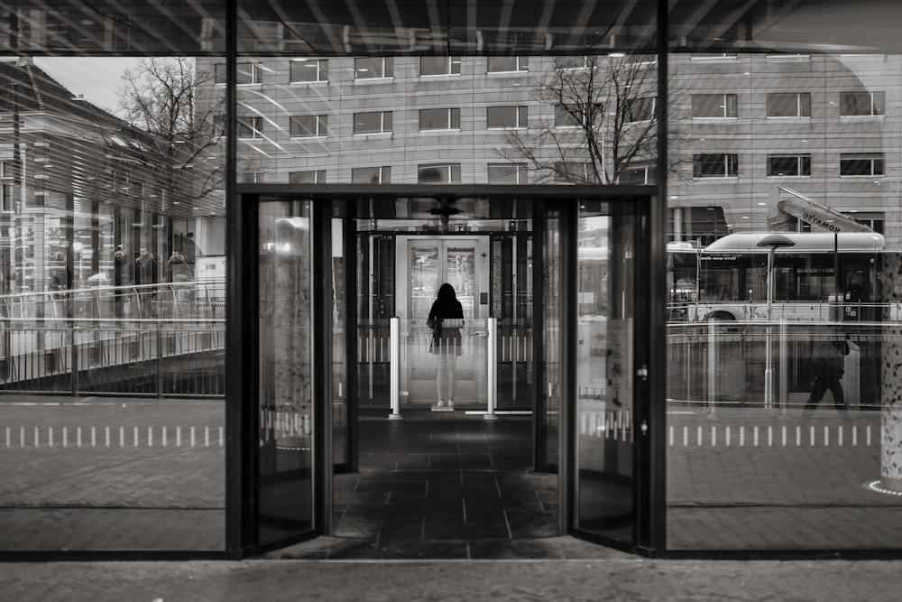 white and brown building with glass windows