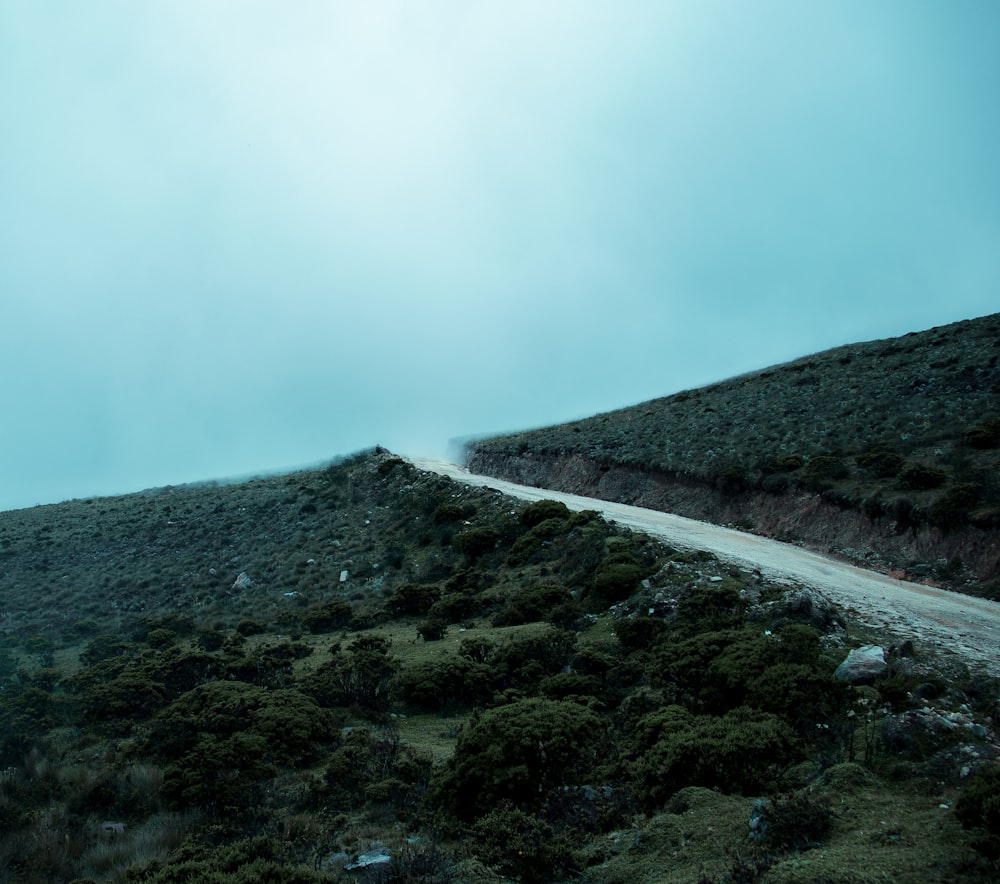 gray mountain under white clouds