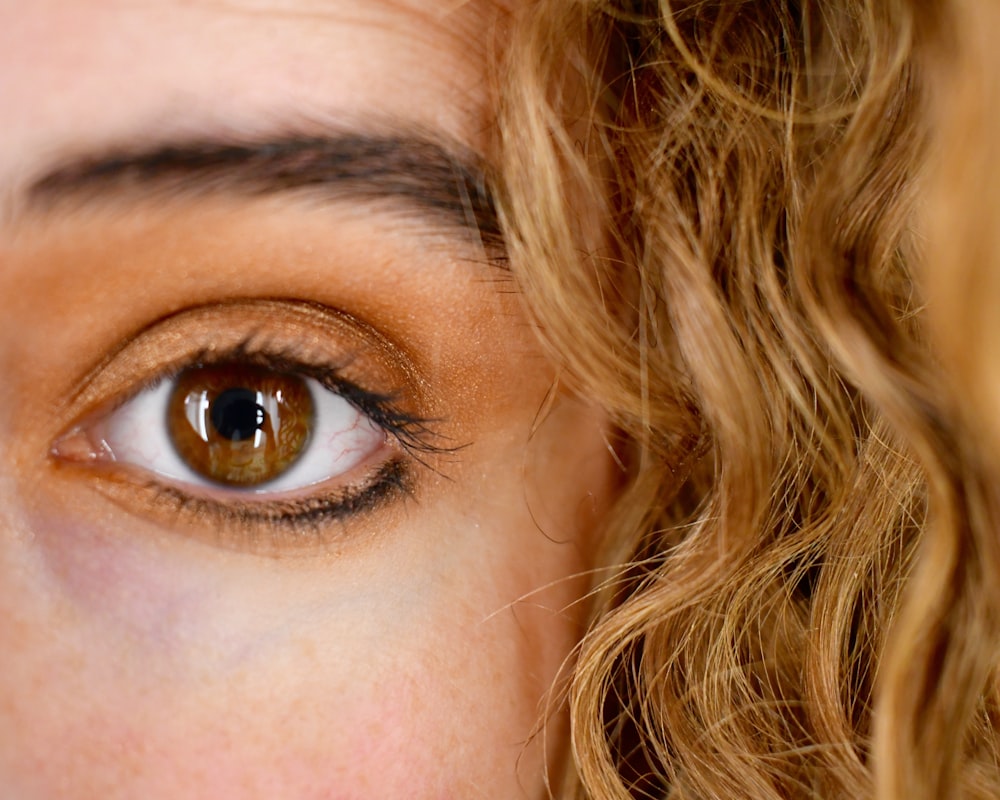 woman with brown hair and blue eyes