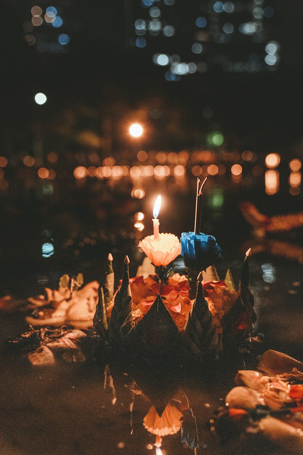 bokeh photography of lighted candles