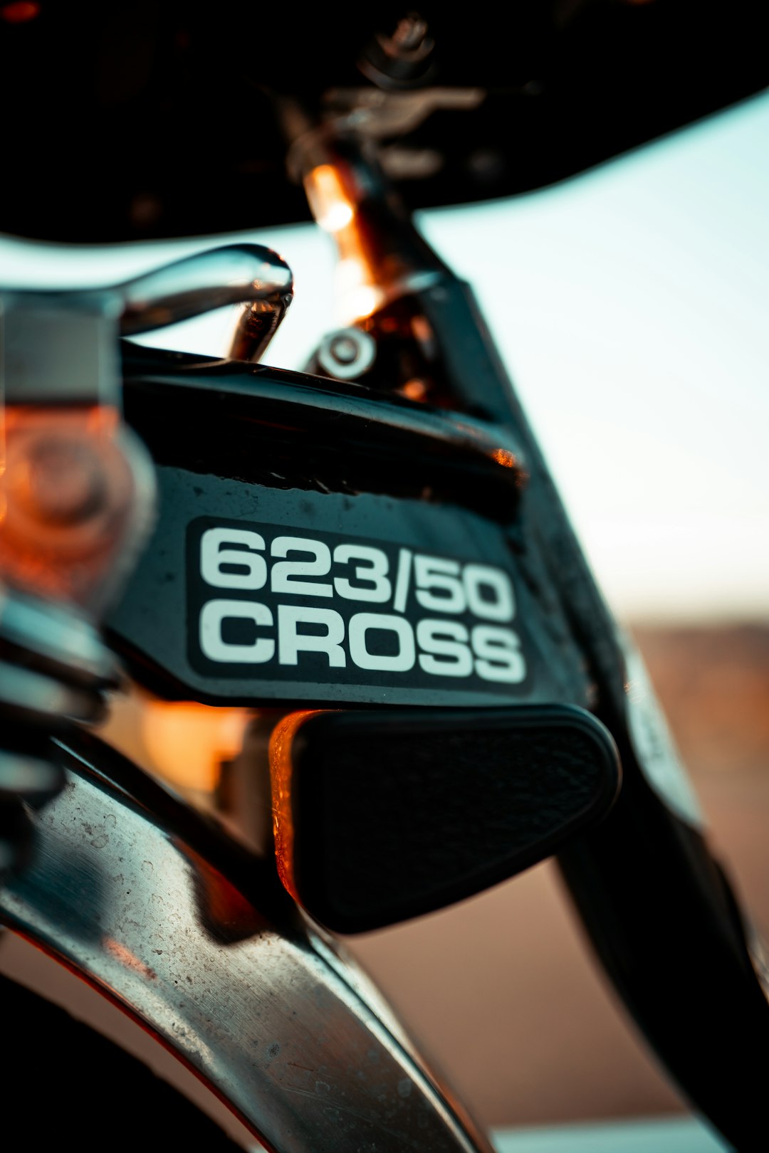 black and orange bicycle in close up photography