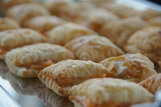 Tray of assorted pastries with flaky crusts and sweet fillings