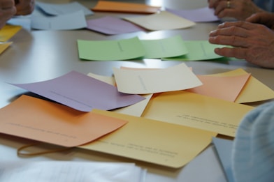 white printer paper on brown envelope