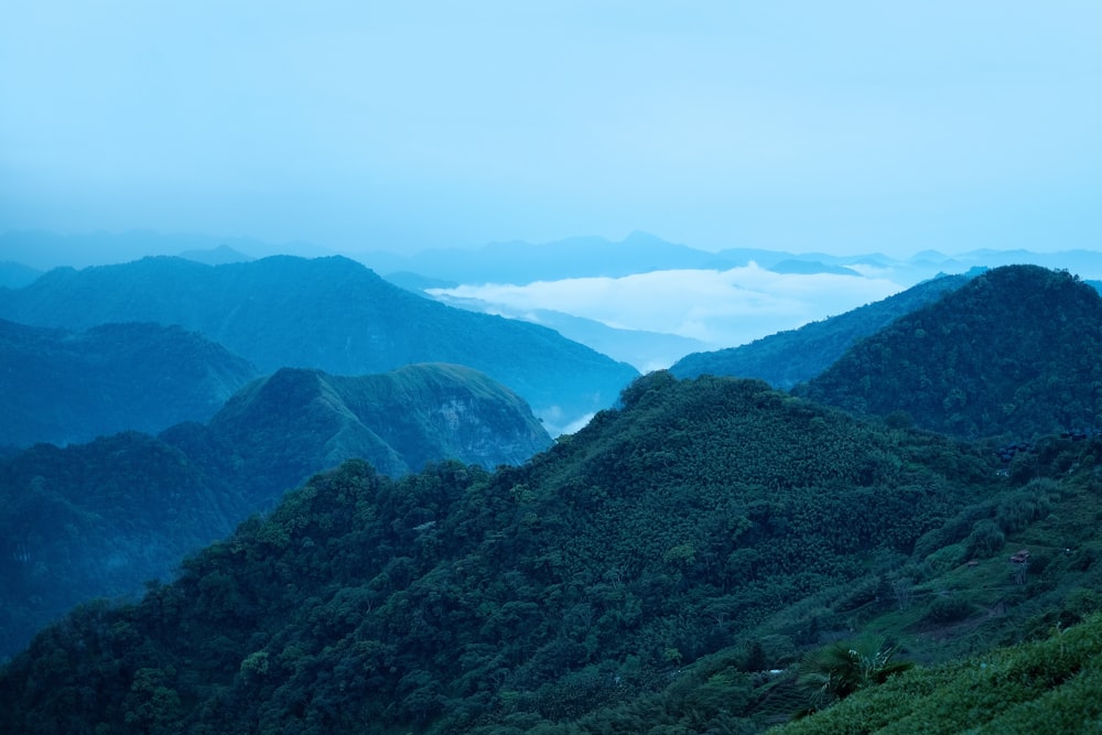 green mountains under white sky during daytime