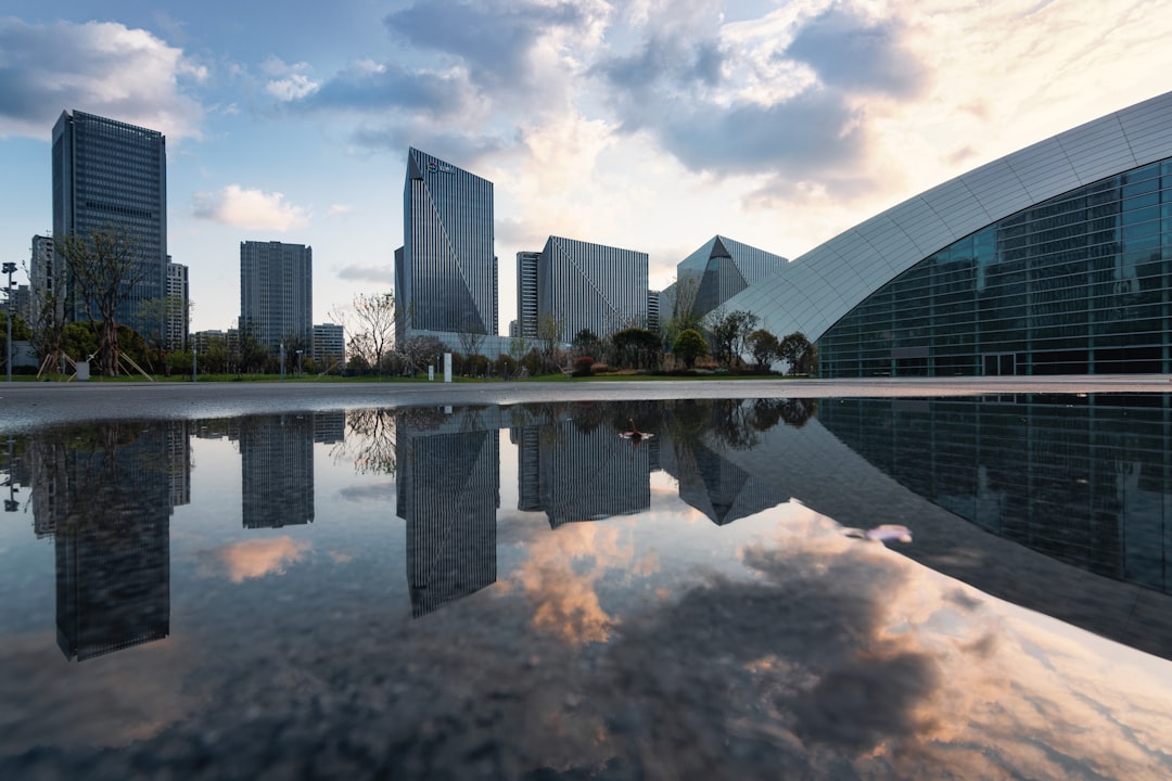 body of water near city buildings during daytime