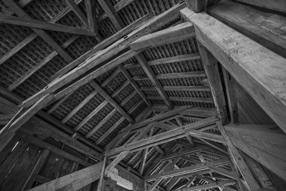 grayscale photo of wooden ceiling