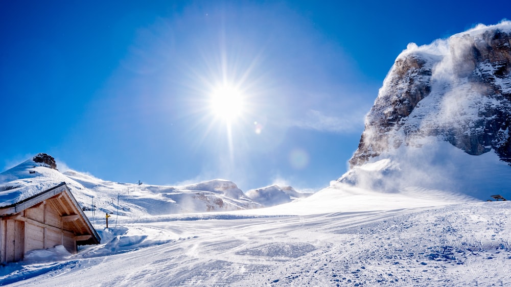 snow covered mountain under blue sky during daytime